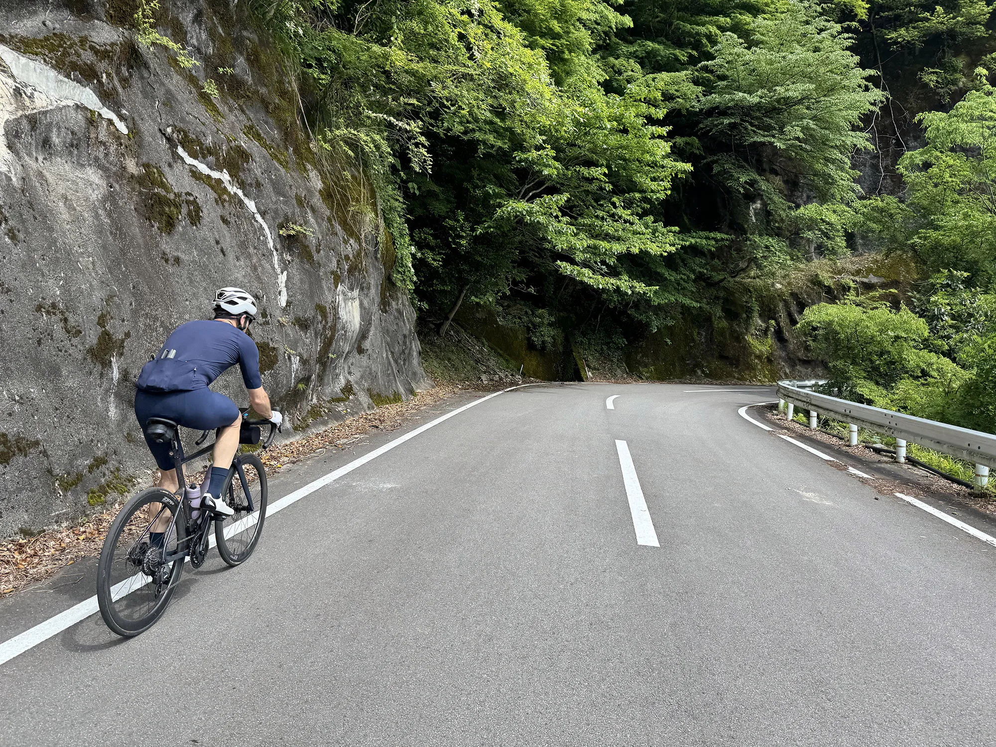 cyclist in japan riding in gore cycling kits.