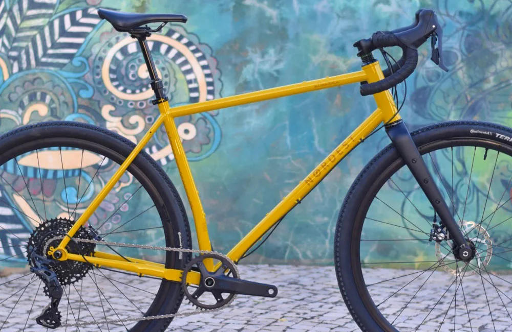 Nordest Super Albarda 3 MTB-inspired steel gravel bike, yellow carbon frameset detail