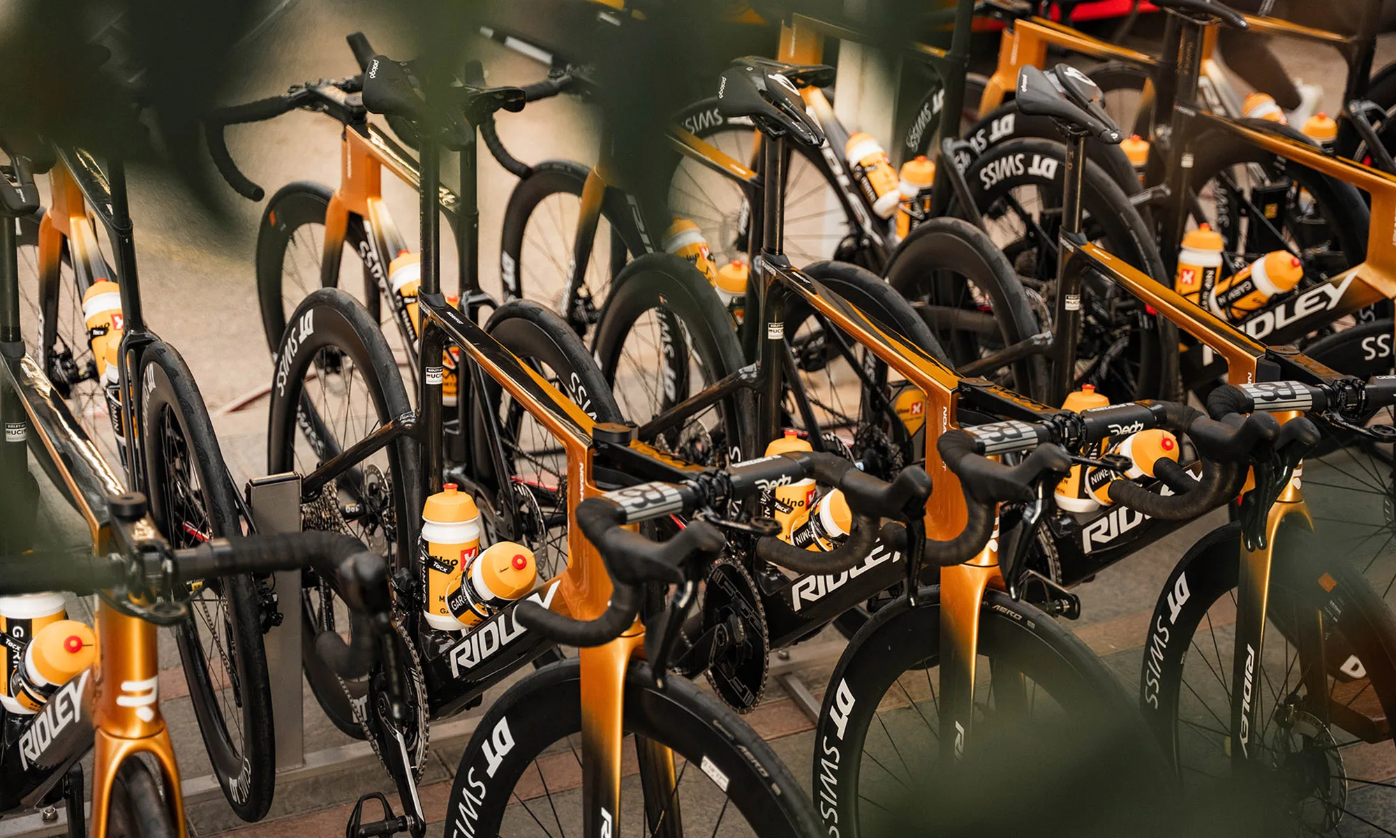 DT Swiss ARC 1100 50 SPO pro-replica aero carbon road wheels get huge logos, hand-built in Europe, UNO-X pit