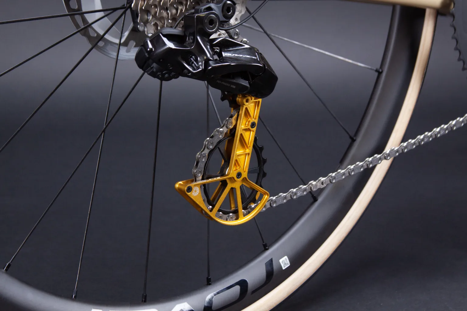 The Kogel Kolossos ST in gold on a Shimano rear derailleur.