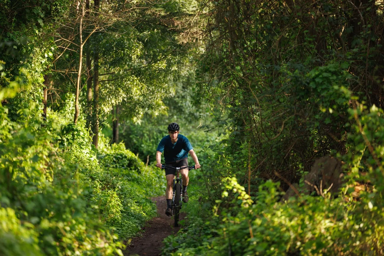 OrNot UV Hooded Trail Shirt in the woods