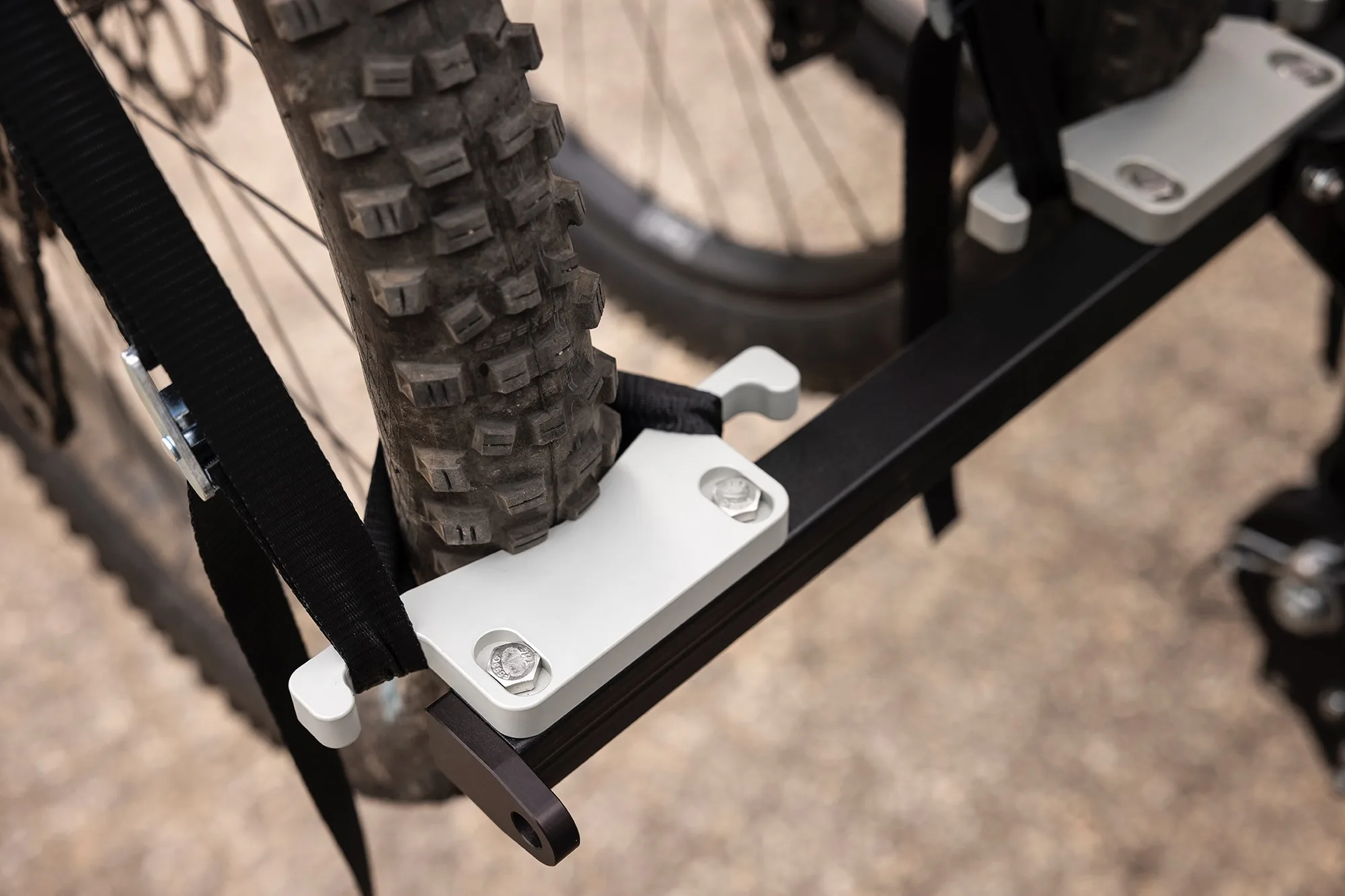 close-up of the replaceable machined aluminum rear tire cradles on the new 1UP-USA Recon Rack