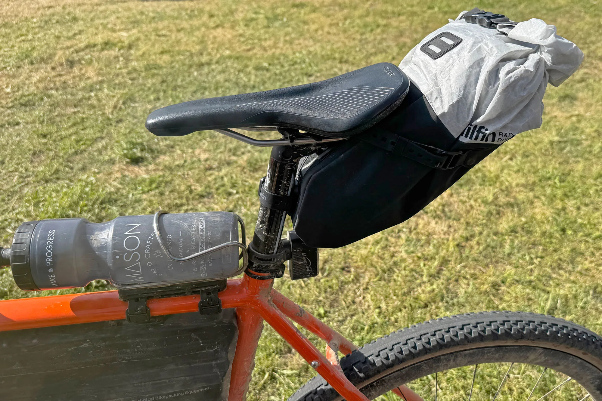 Tailfin R&D Division ultralight prototype rackless bikepacking saddle bag on Josh Ibbet's Mason Bokeh gravel bike at Traka, side