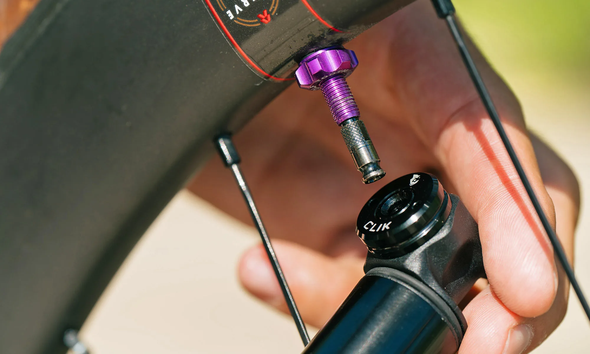 Wolf Tooth adopts Clik Valve for EnCase mini-pumps & colorful alloy Tubeless Valves, up close