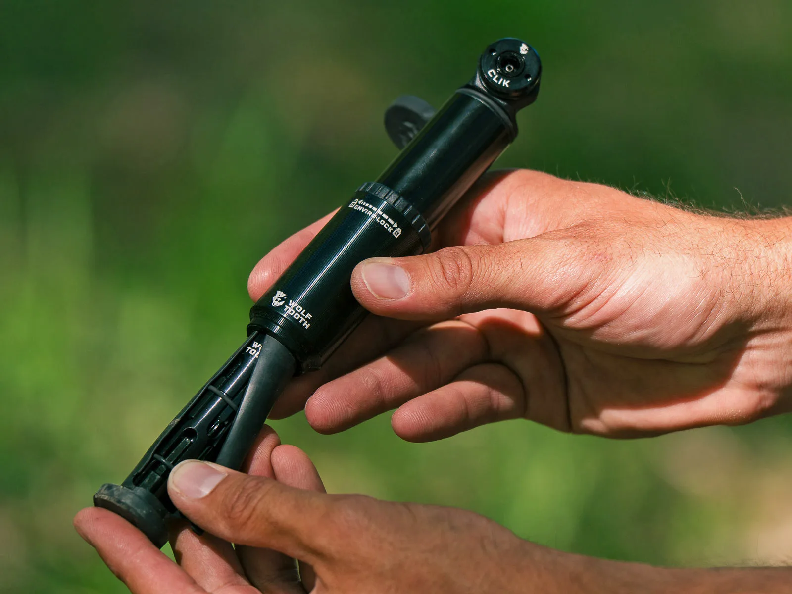 Wolf Tooth adopts Clik Valve for EnCase mini-pumps, repair tools tucked inside