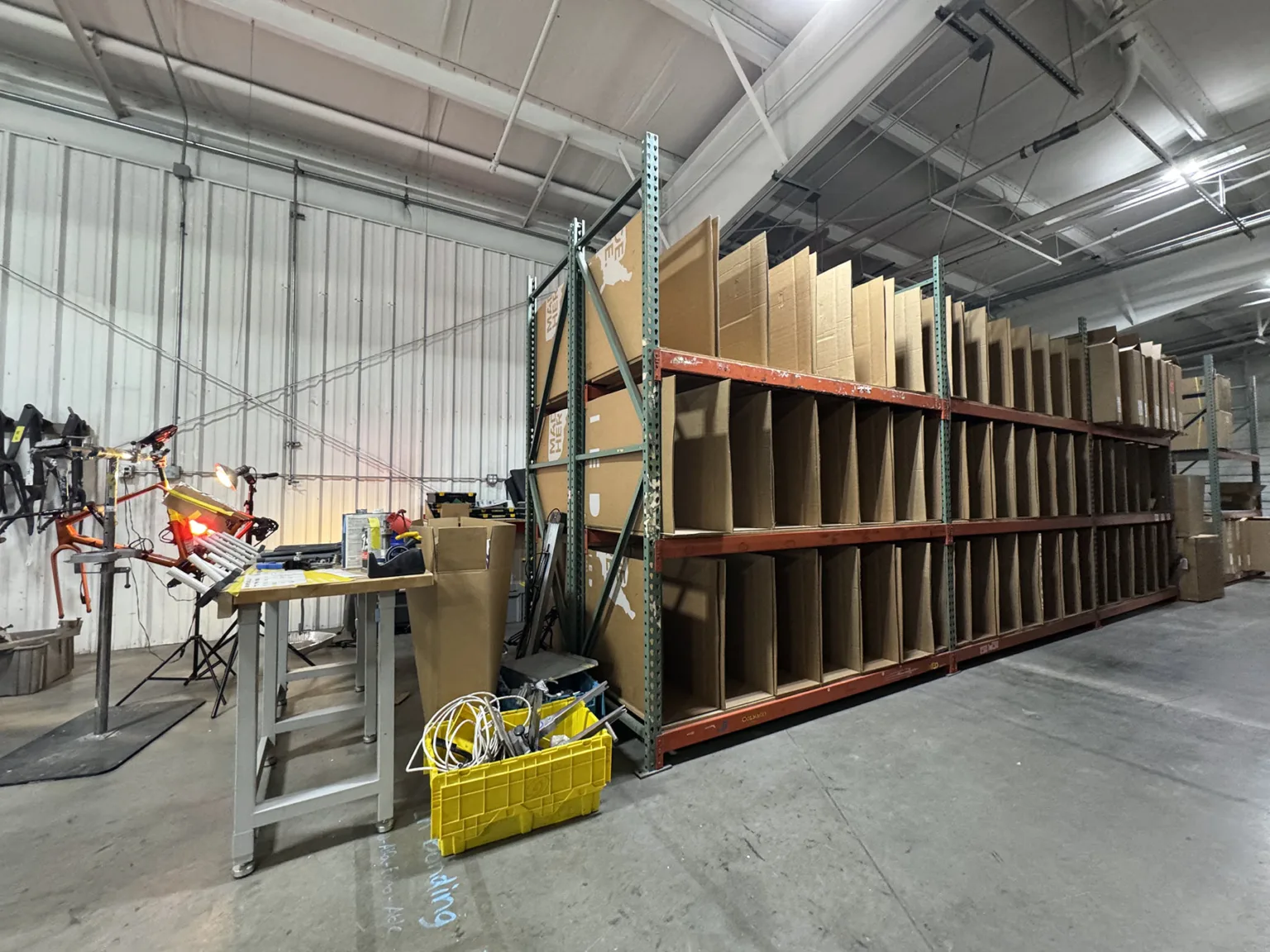 allied cycles HQ tour frame inventory rack.