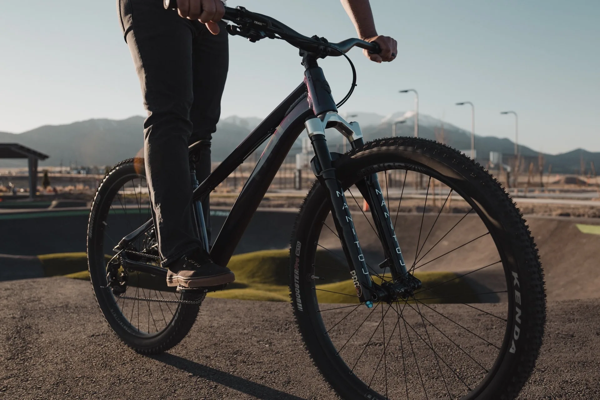 A rider at the pump track on the new Ari 801 bike
