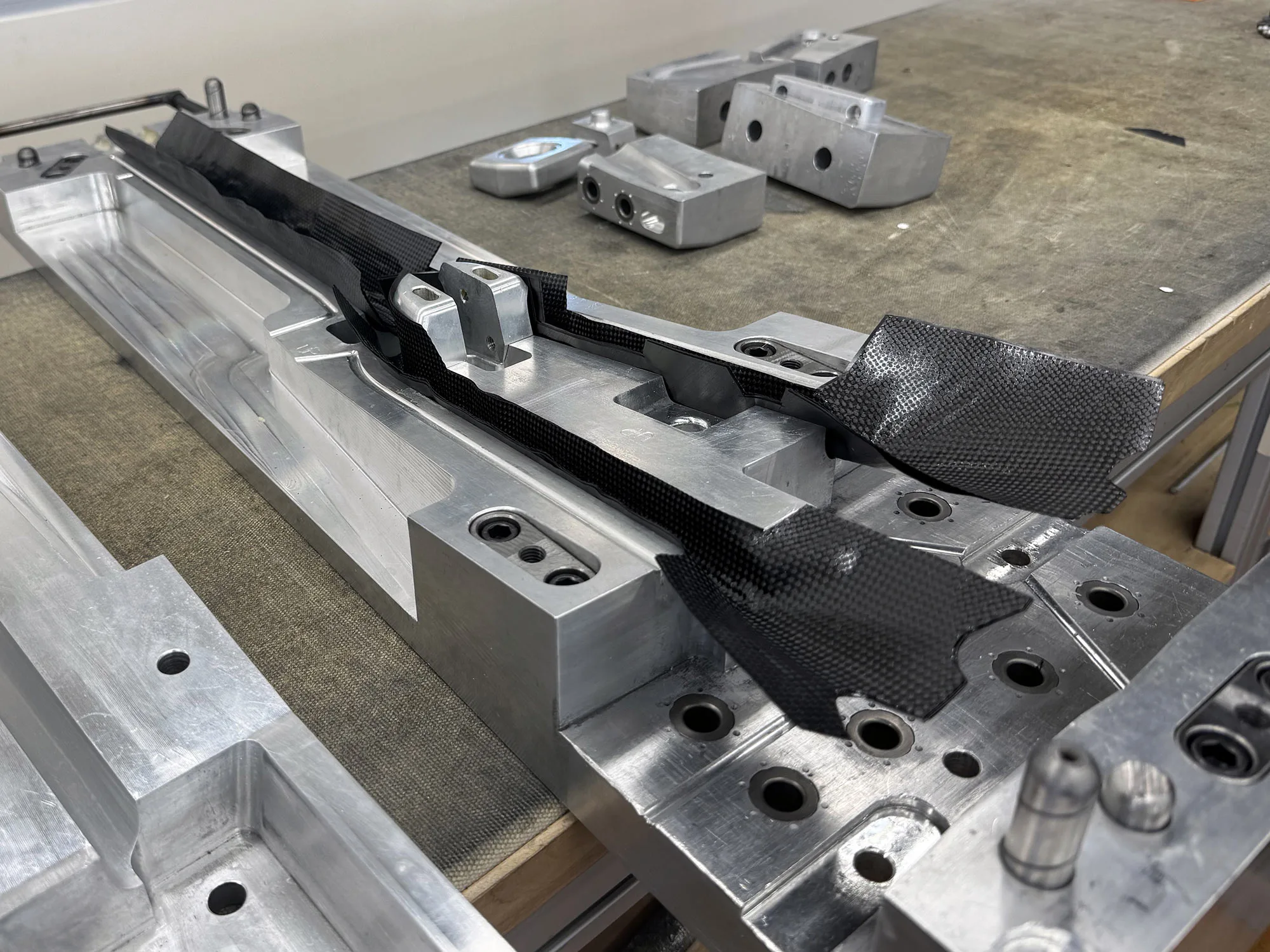 parlee carbon fiber fork carbon layers being laid into a mold.