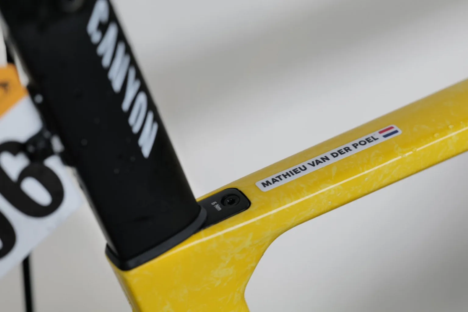 2025 Tour de France MyCanyon Aeroad CFR yellow jersey edition of Mathieu Van der Poel, toptube name decal