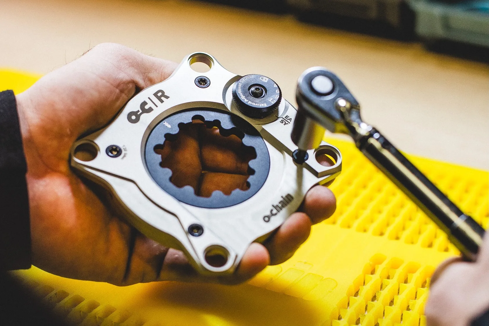 A worker assembling an Ochain R spider