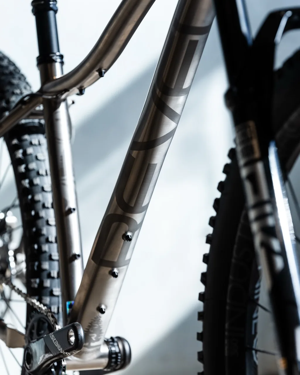 Revel Bikes New Titanium Line Wayward logo