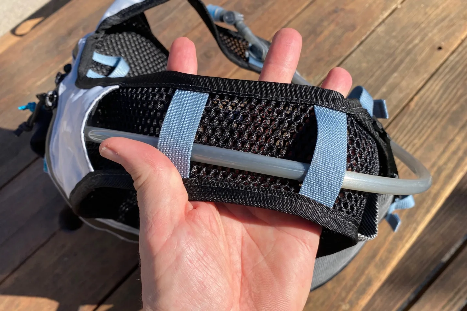 The mesh material used in the straps and back panel of the pack