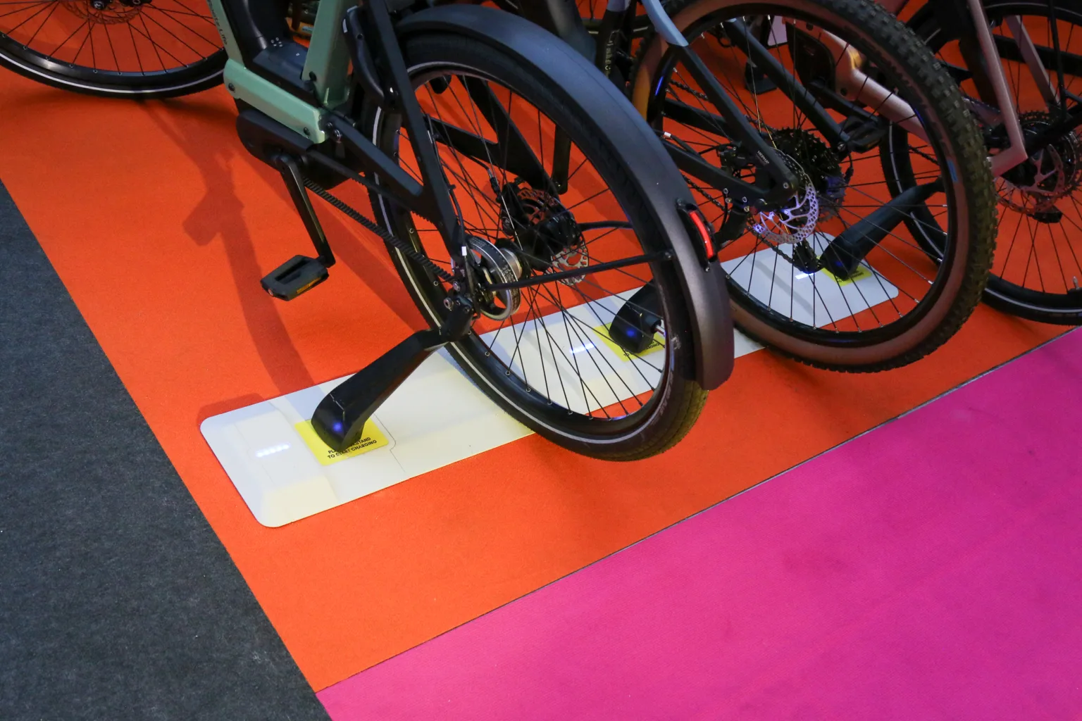 Tiler wireless ebike charging kickstand
