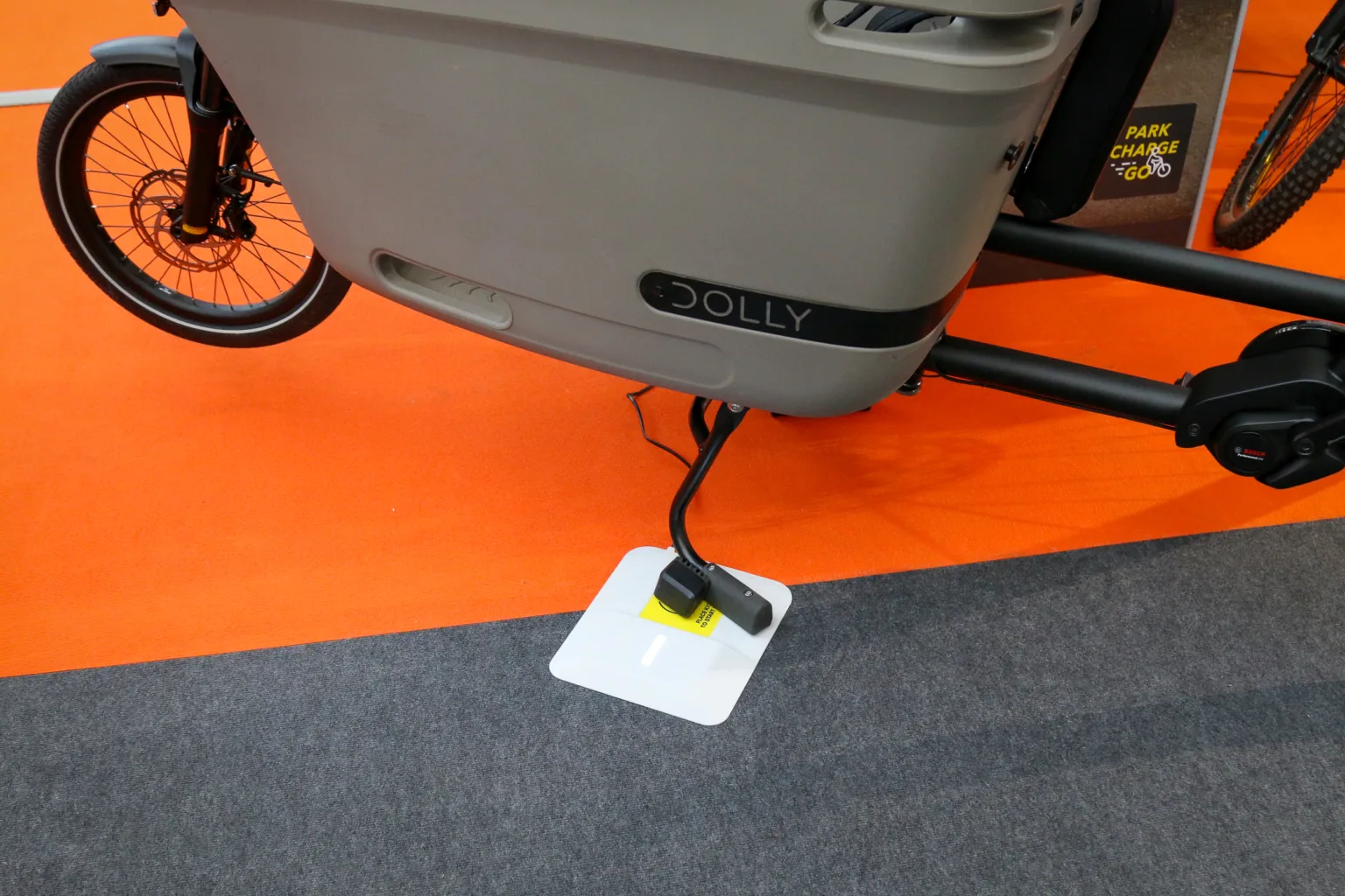 Tiler wireless charging e-cargo bike kickstand