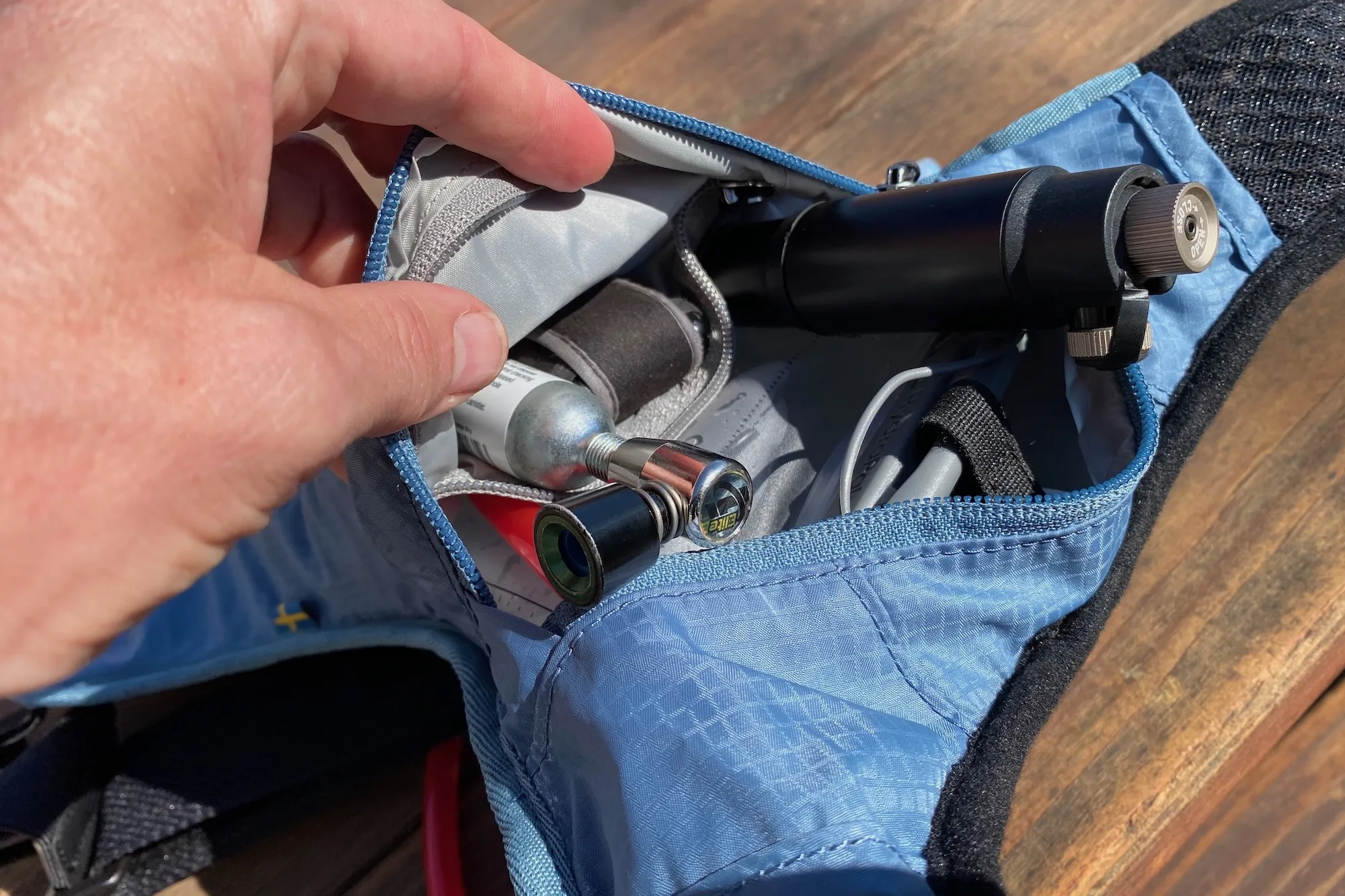 The top zipper makes for relatively tight access to the zippered internal stage pocket.