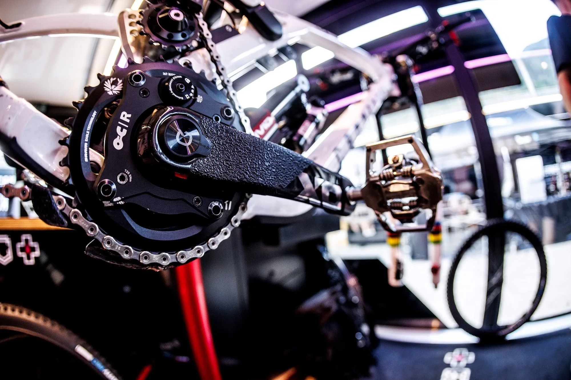 An ochain spider mounted on a downhill bike in the world cup pits