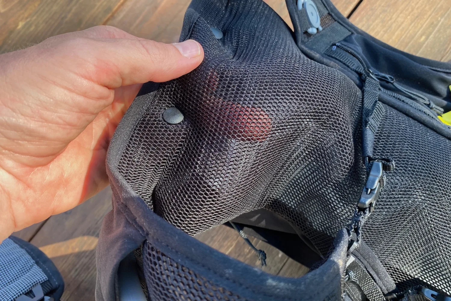 The thin mesh material of the back panel of the velocio pack