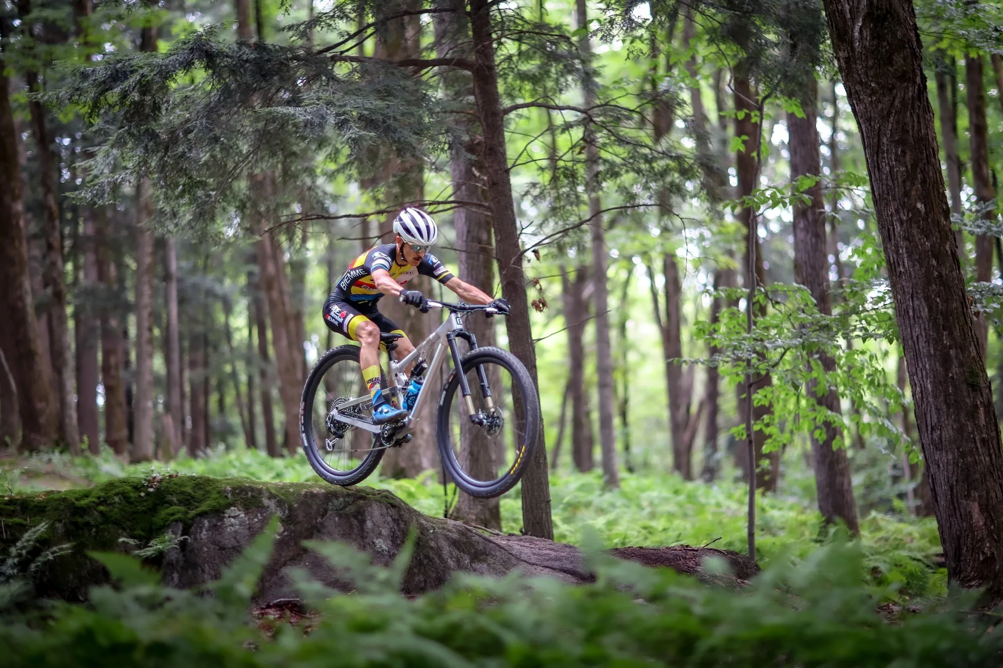 a test rider taking the Big Ben protoype off a drop