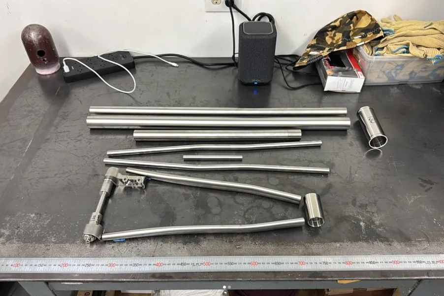 A titanium tubeset laid out on the table for Ari's own Road38 frame