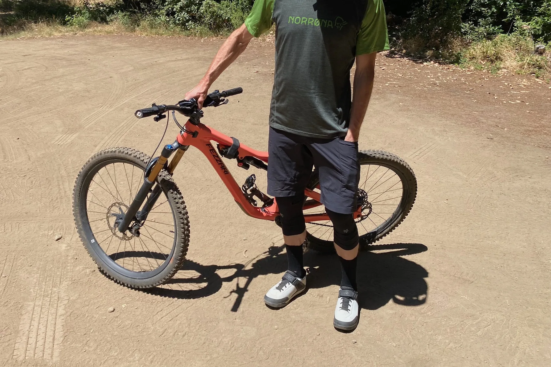 Sticking a hand in the pocket of the Norrona Flex1 Tech shorts
