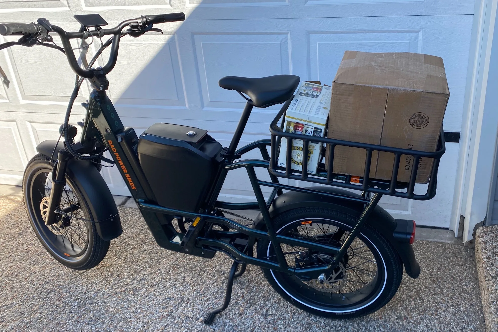 The rear rack of the Radrunner max loaded up with a couple large boxes