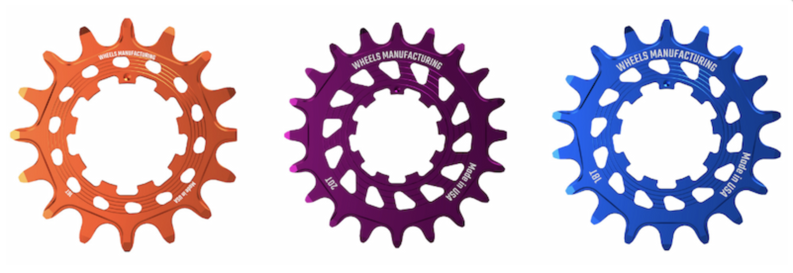 three options for the Wheels Mfg SOLO-HG cogs, orange, purple, and blue