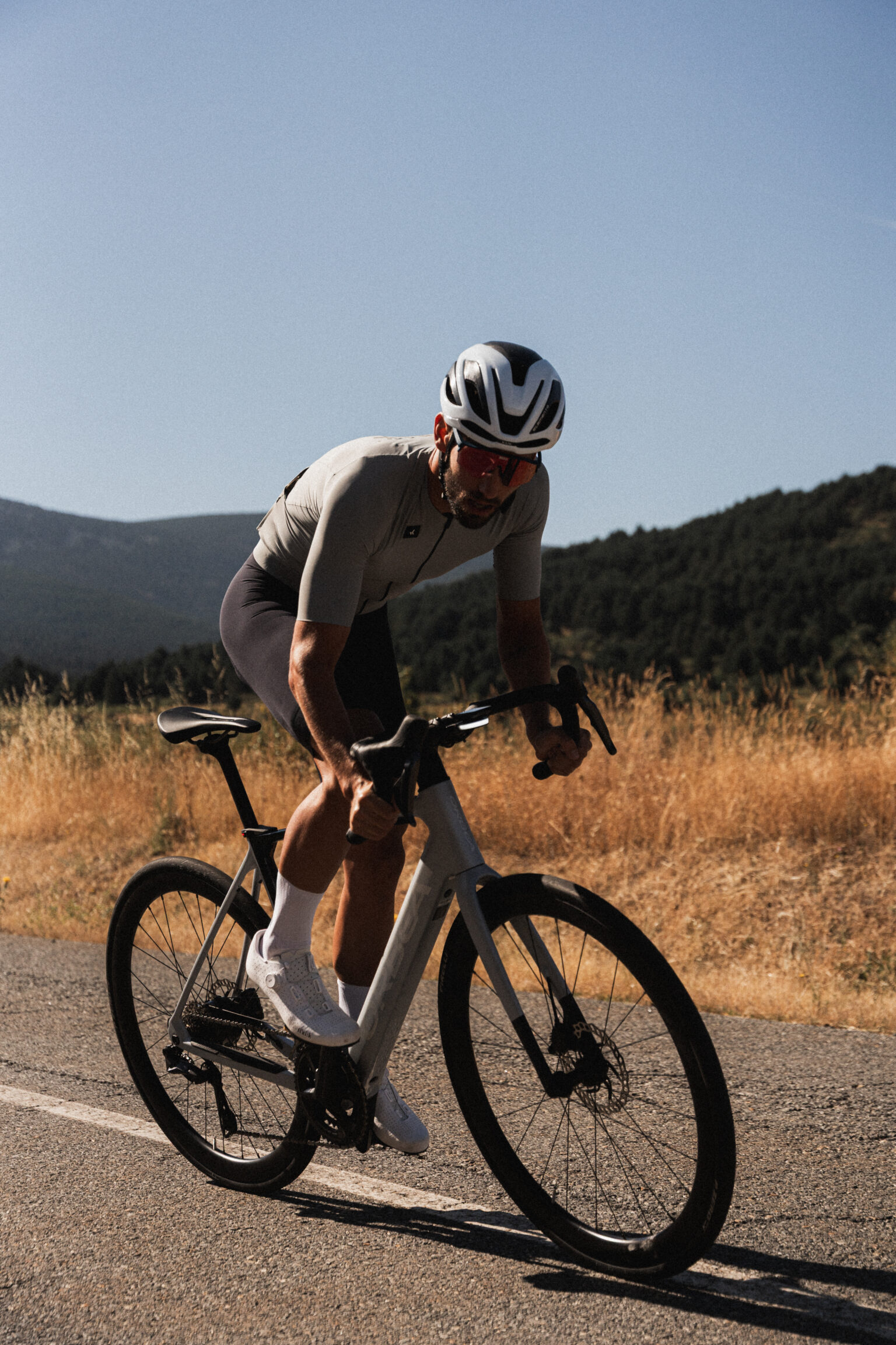 pedaling on a remote road on a Mahle X20 assisted bike