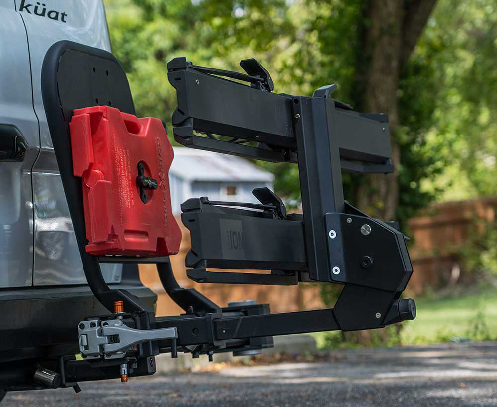 closeup of accessory mount hoop molle panel on kuat pivot xd swing out hitch mount.