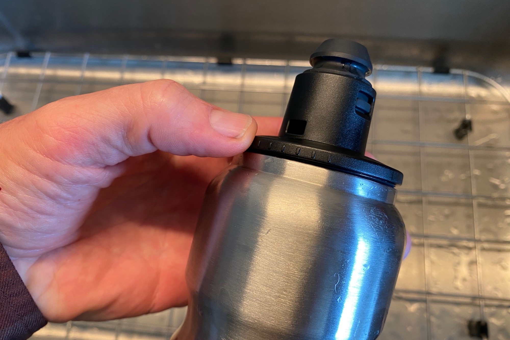 the side of the lid on the tiibo insulated bottle