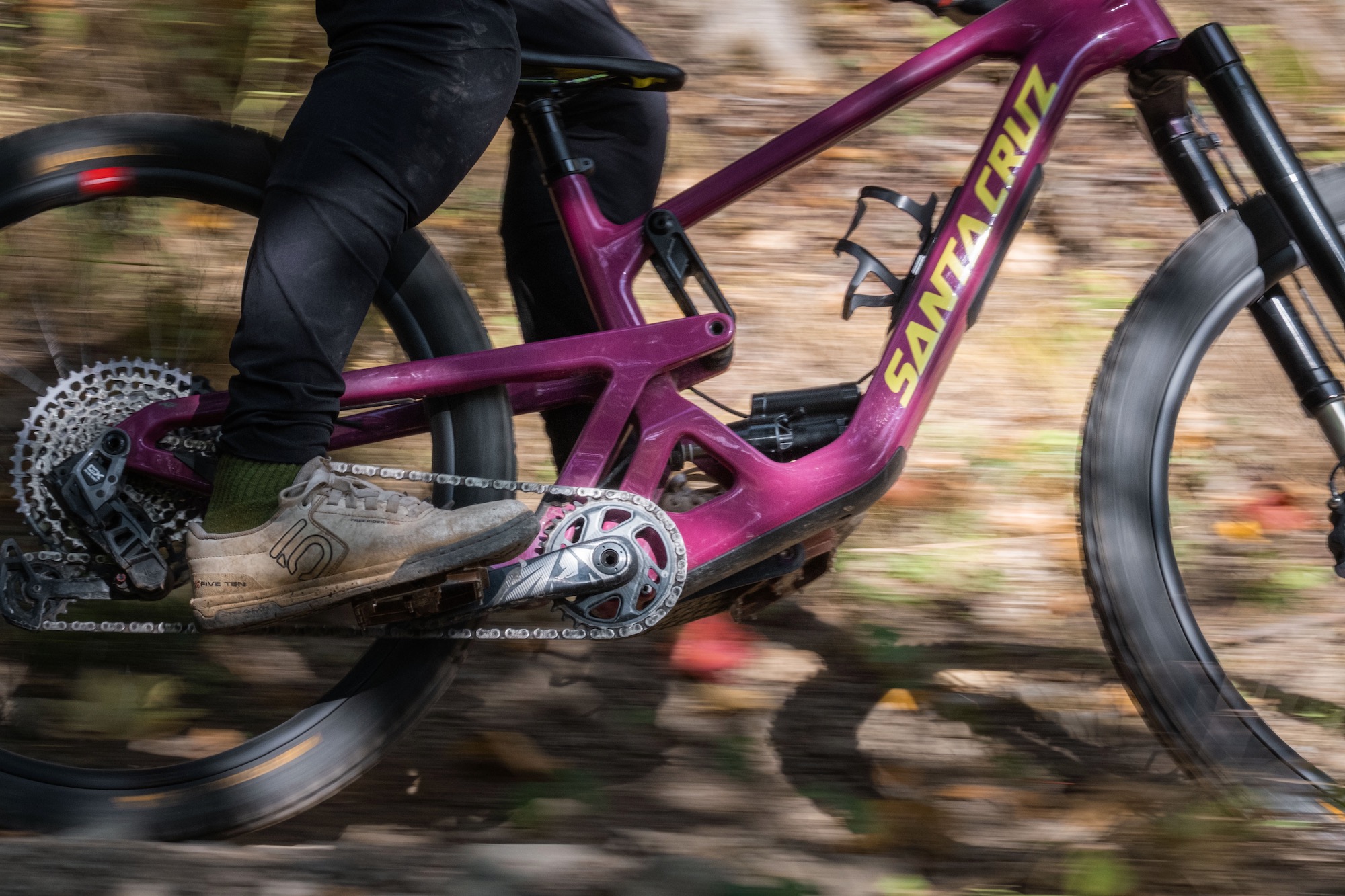 a santa cruz bike with the Hover shock being ridden outside.