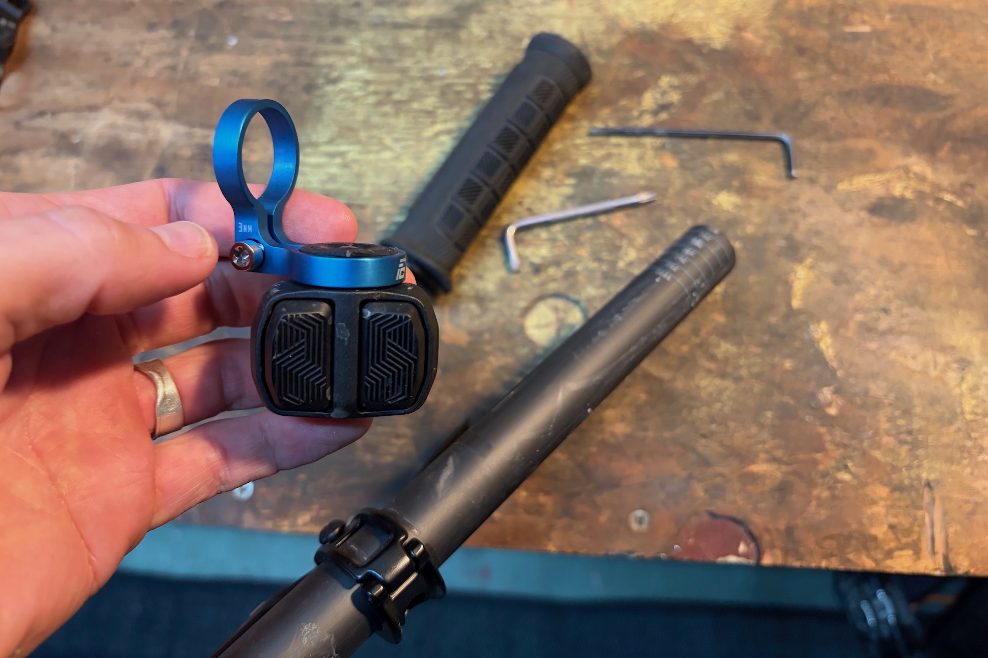 installing the 90 degree pod clamp on a mountain bike handlebar
