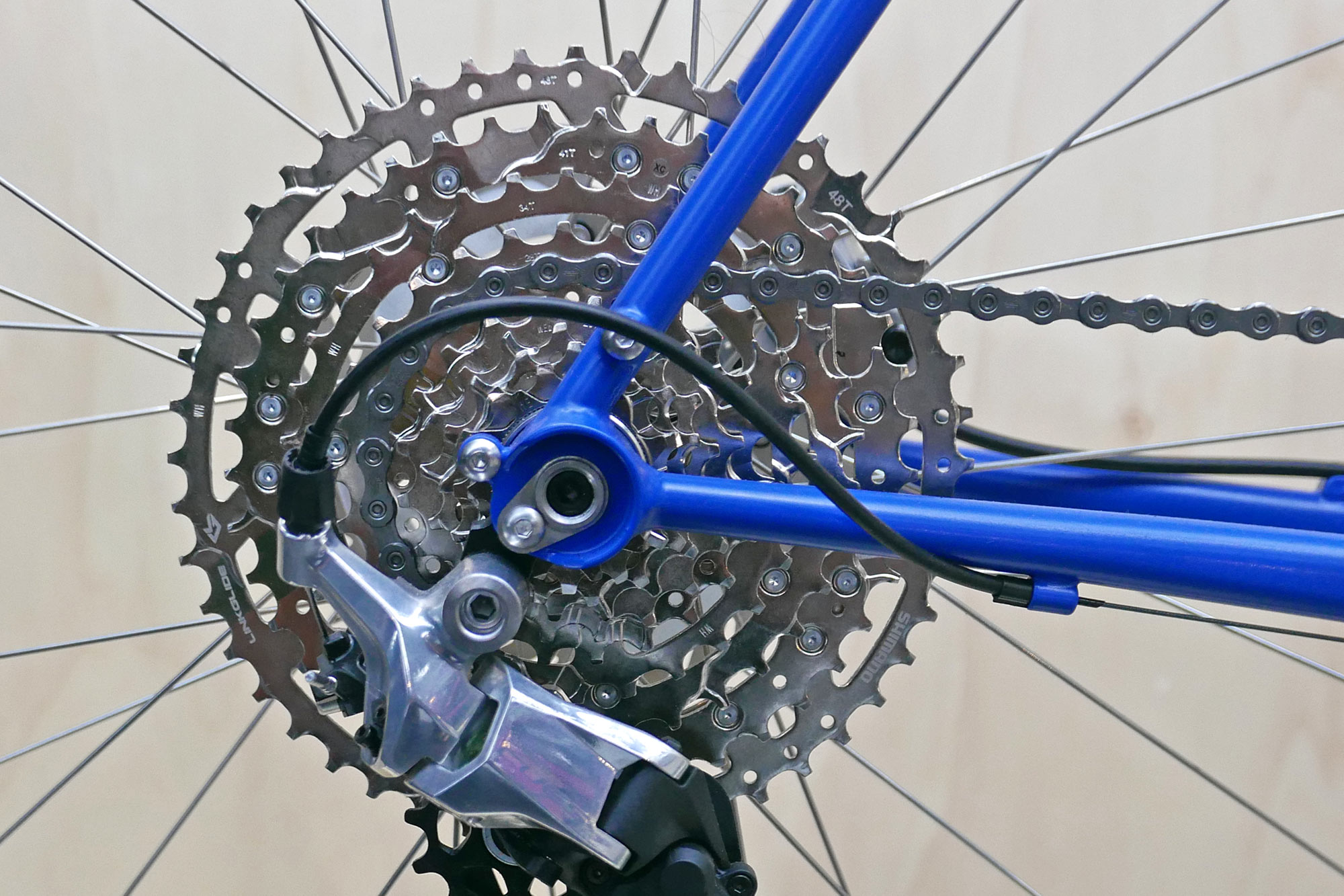 Shimano CUES polished silver 1x10 drop bar groupset, cassette