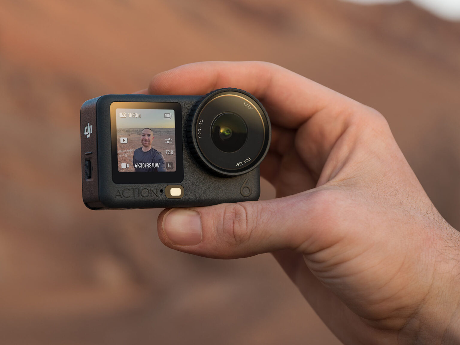 dji osmo action 6 held in a hand.