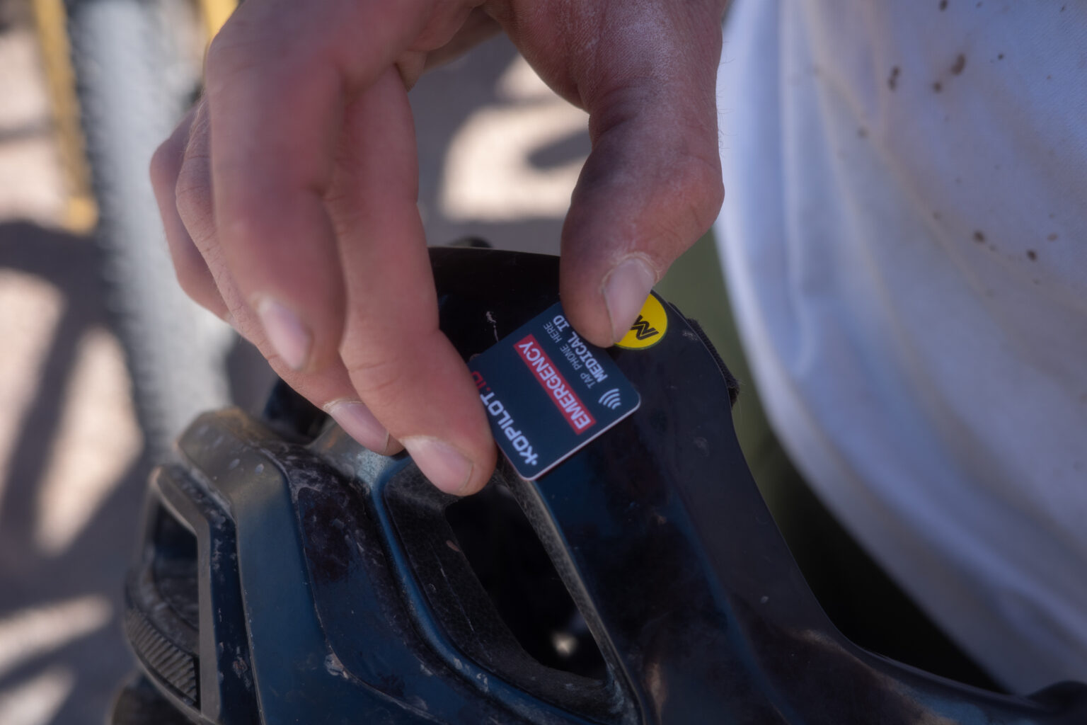 KOPILOT.ID NFC tag sticks to a helmet