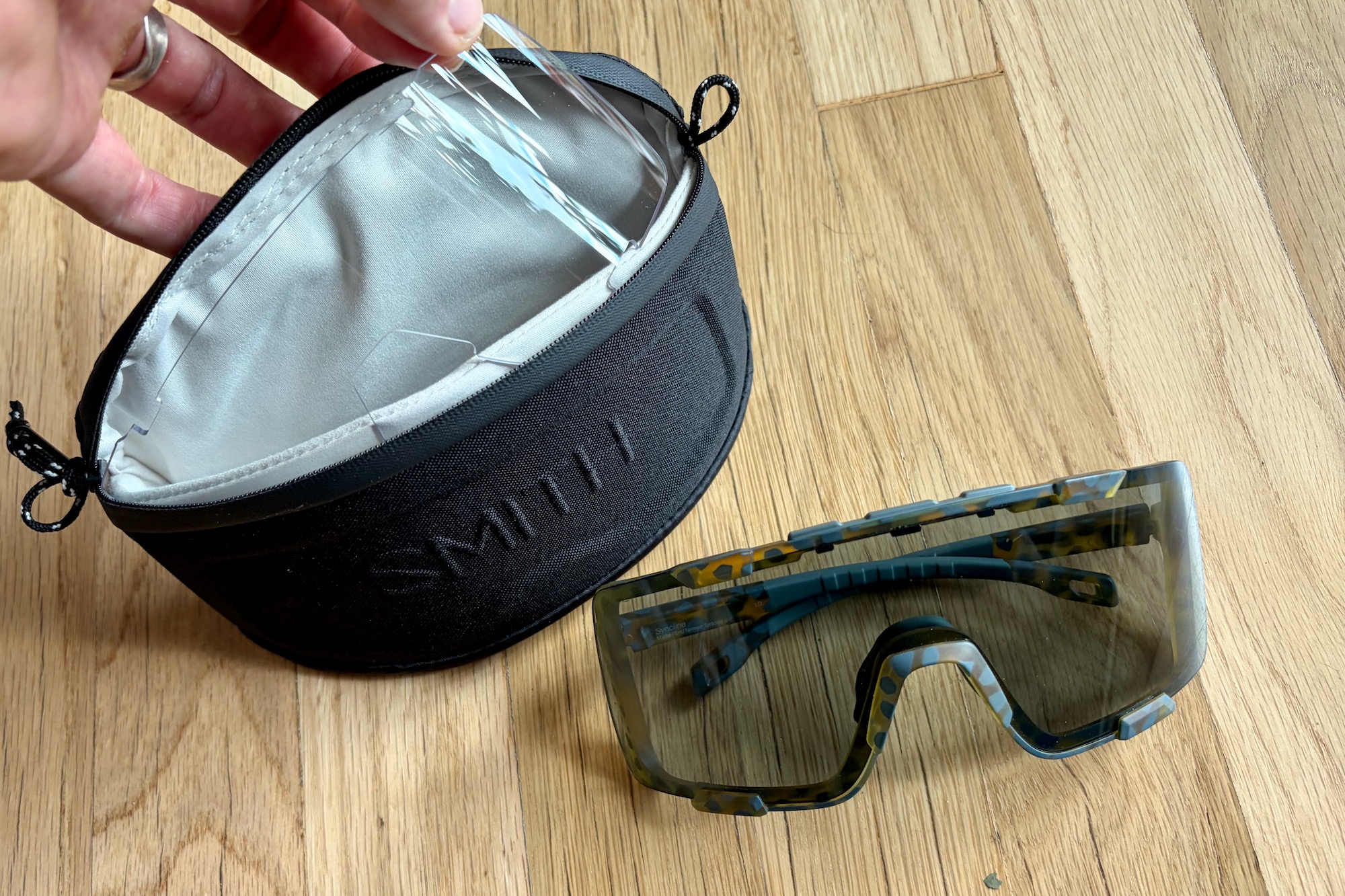 The Smith Syncline glasses with the case and spare lens.