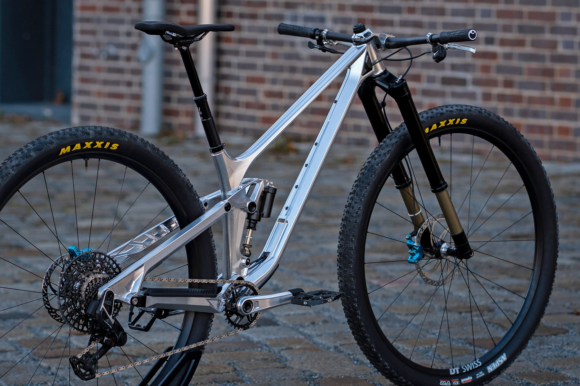 Actofive I-Train 32" CNC-machined alloy full-suspension trail bike, angled driveside