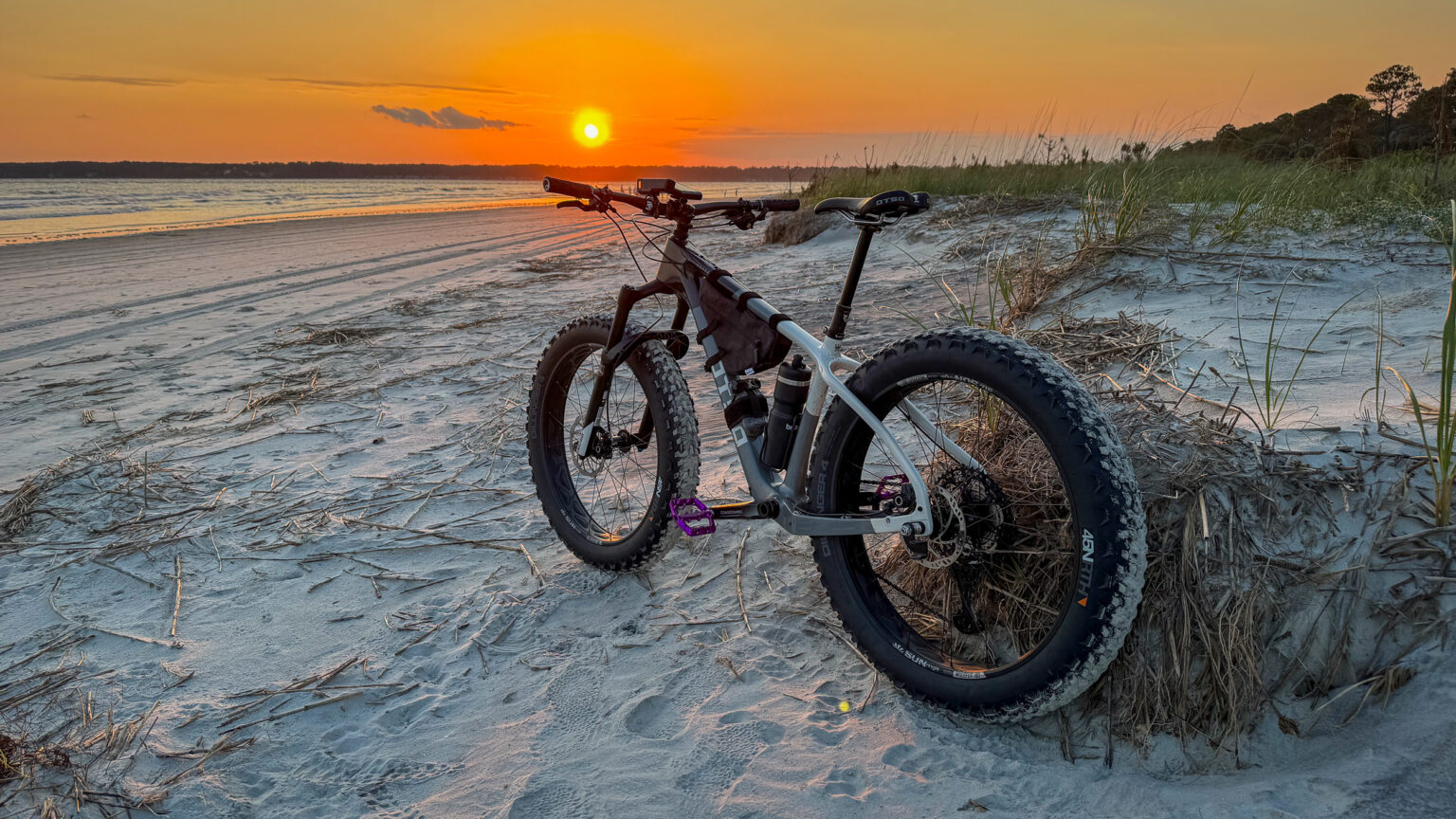 Fat bike at sunset on beach