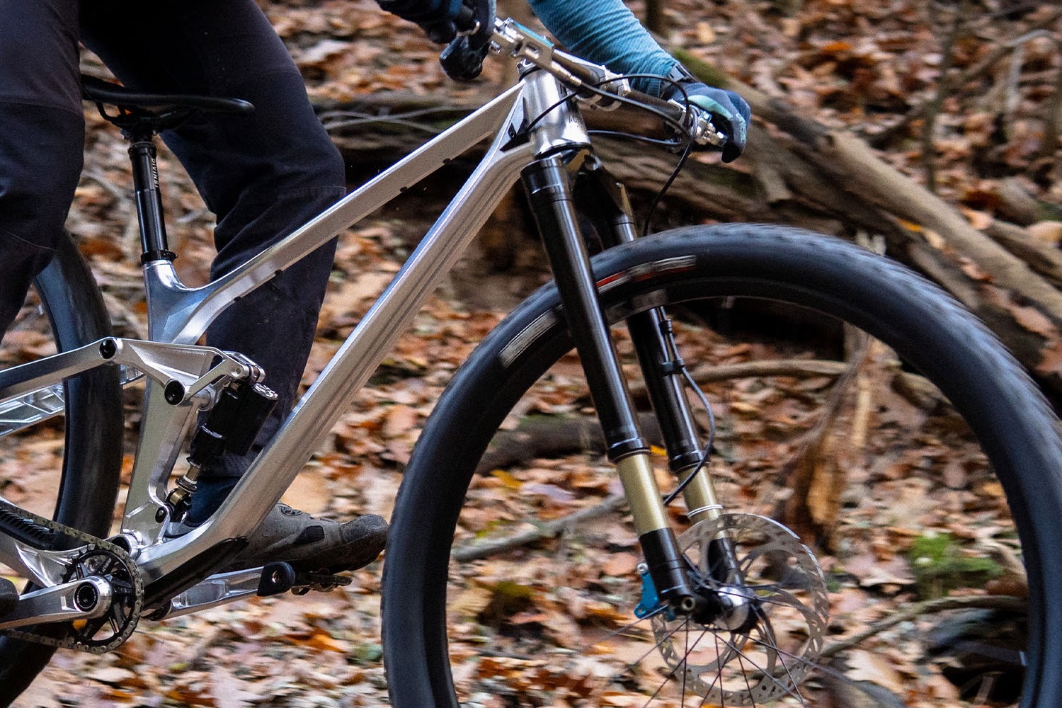 A rider on the Actofive I-train 32 bike with the Intend Samurai 32 fork.