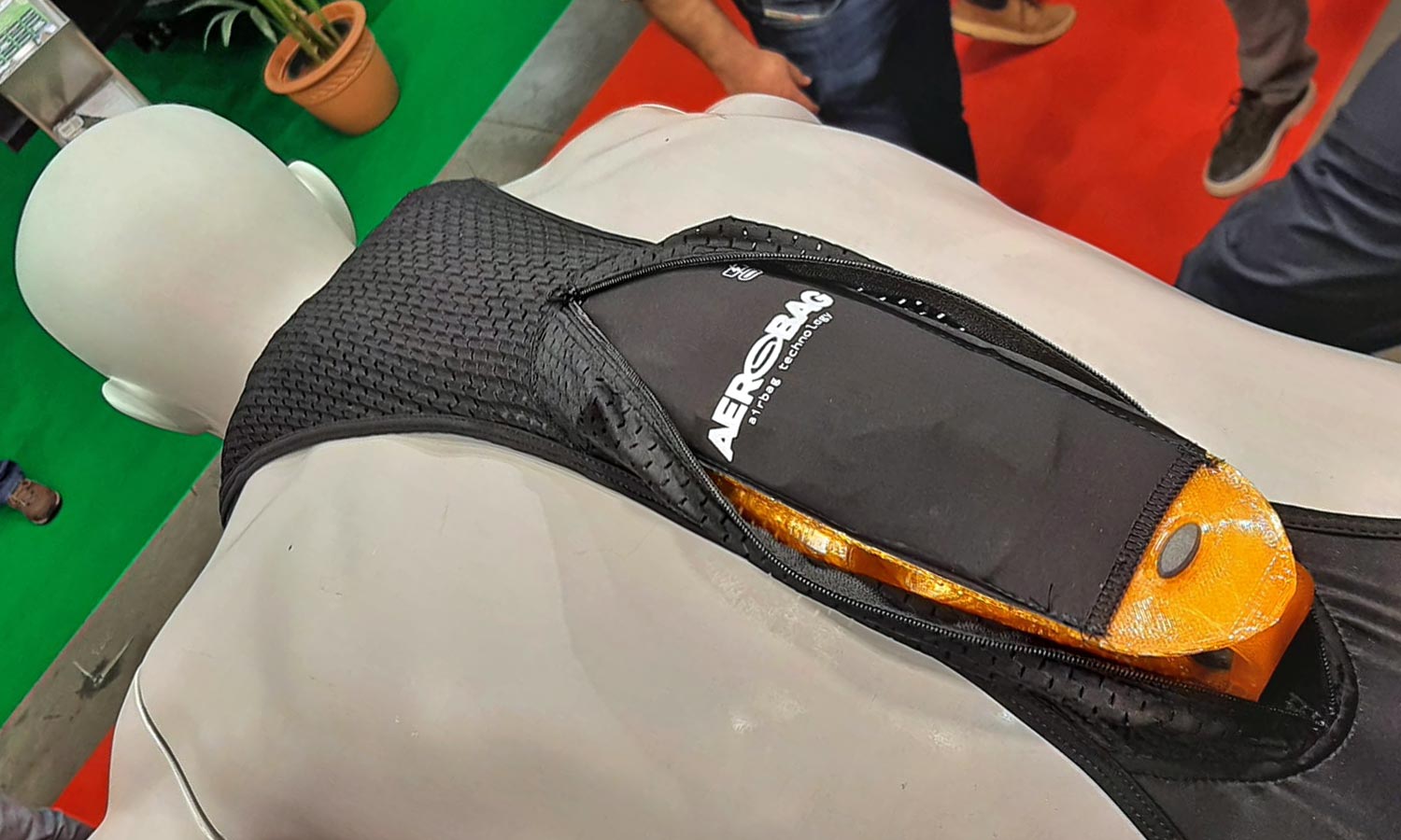 Aerobag ultralight compact airbag for performance professional cyclists integrated into your favorite bib shorts, hardware close-up on your lower back