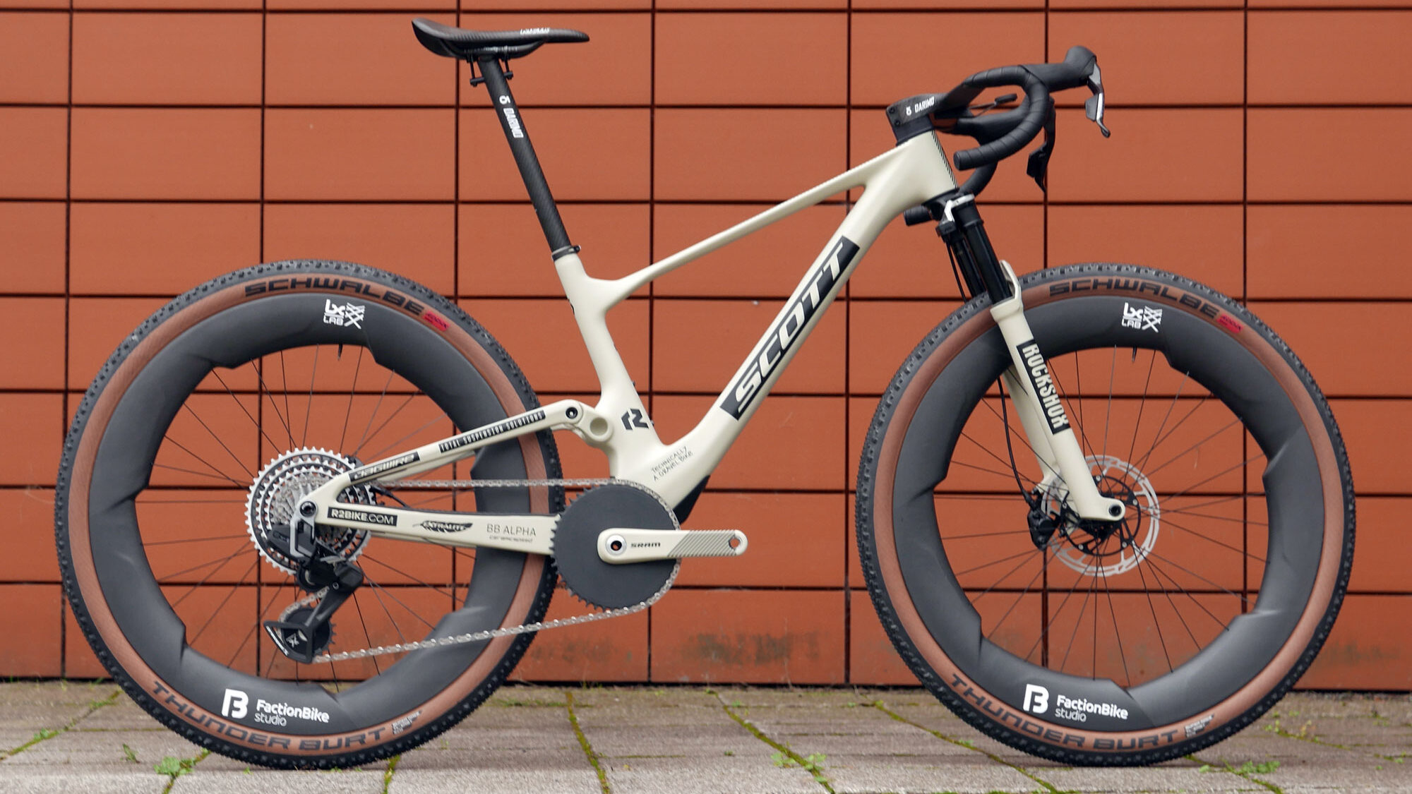 Dangerholm + FactionBike Studio LX Lab prototype ultra-wide aero carbon gravel wheel concept on a full-suspension gravel bike