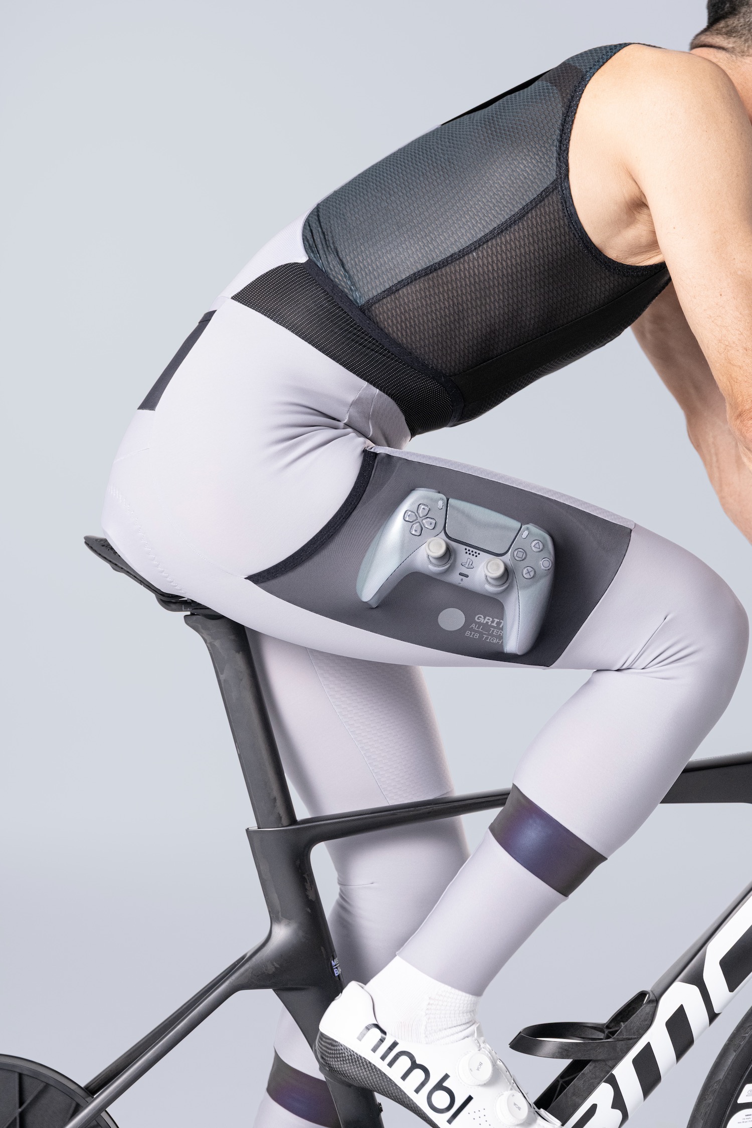 Gobik GRIT 2.0 bib tights with video game controller.