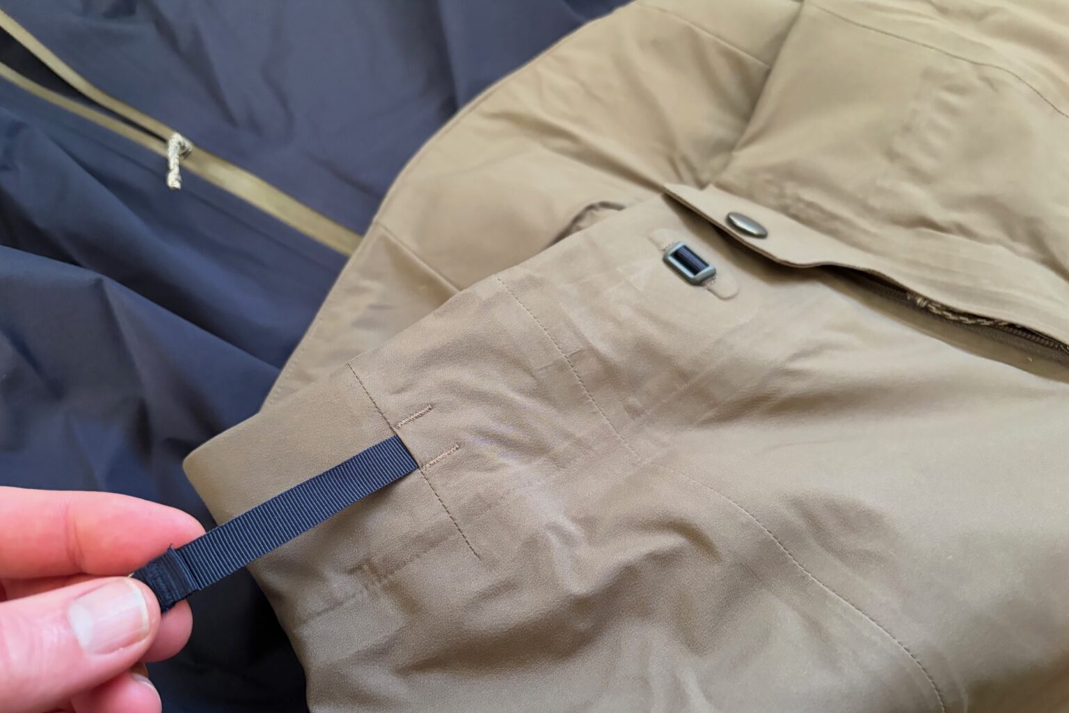 the waist adujster on the Dirt Roamer Storm pants.