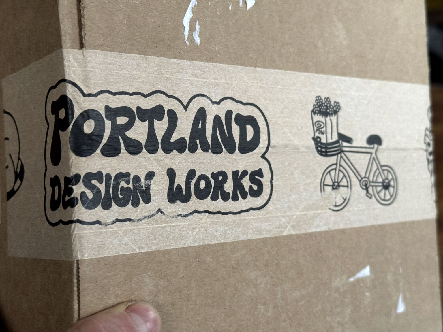 Portland Design Works fun & functional bicycle accessories, plus cool packing tape - logo & bike