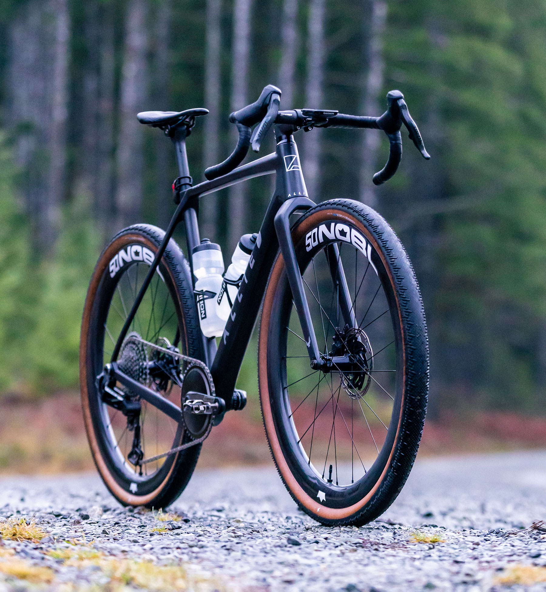front angle view of bike with nobl far series gravel wheels on it.