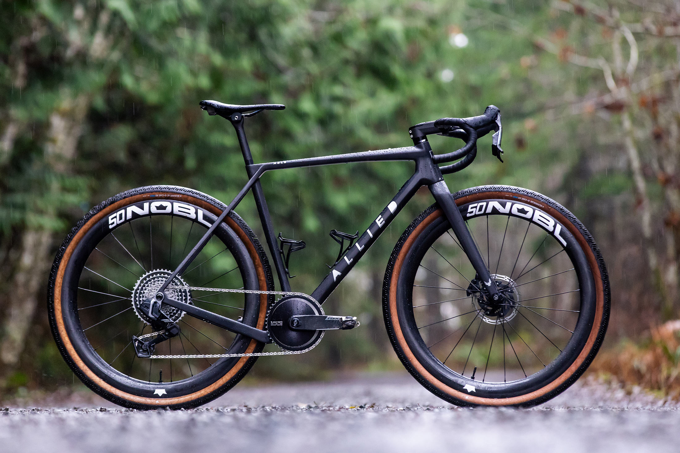 side view of bike with nobl far series gravel wheels on it.