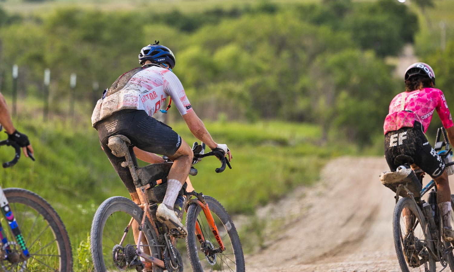 Rob Britton winning 2025 Unbound XL gravel race with prototype Castelli Unlimited aerodynamic gravel racing Skinsuit, rear view