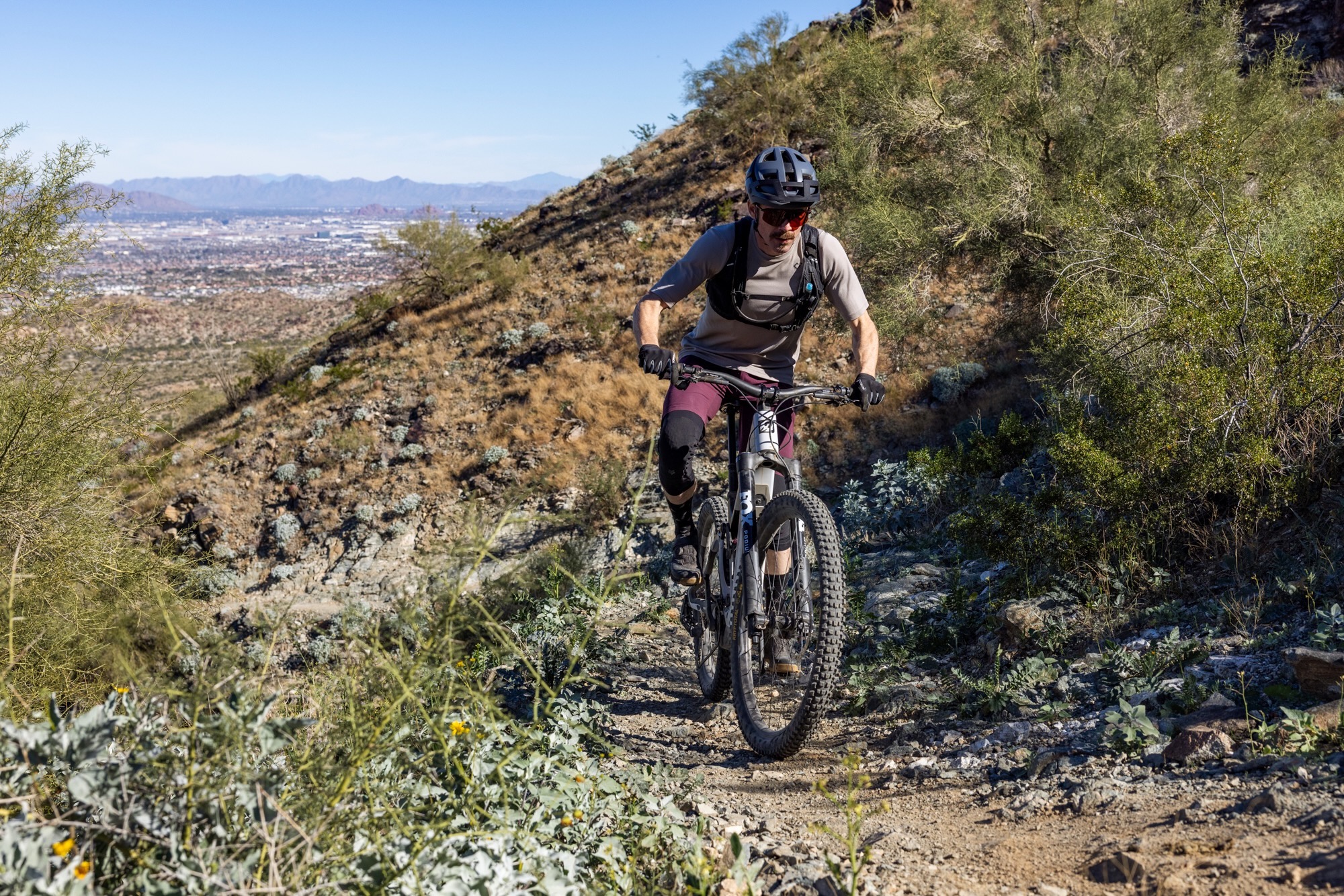 Climbing up a steep trail on South Mountain while testing the Shuttle LT