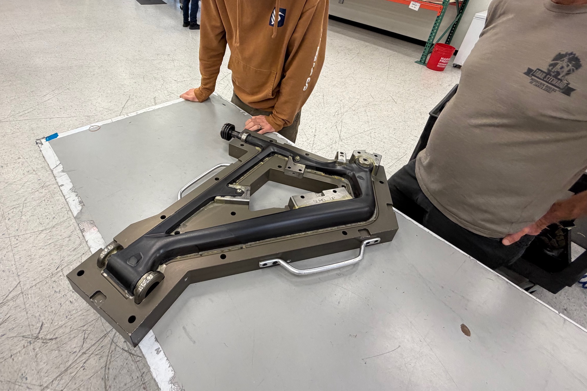 inspecting a fresh Ripley SL frame that just came out of the mold at the Ibis solar factory.