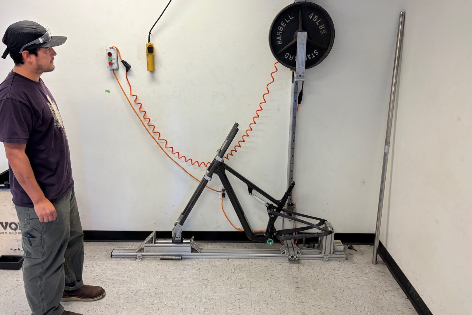 Evan dropping a weight on a Ripley SL frame to test its strrength.