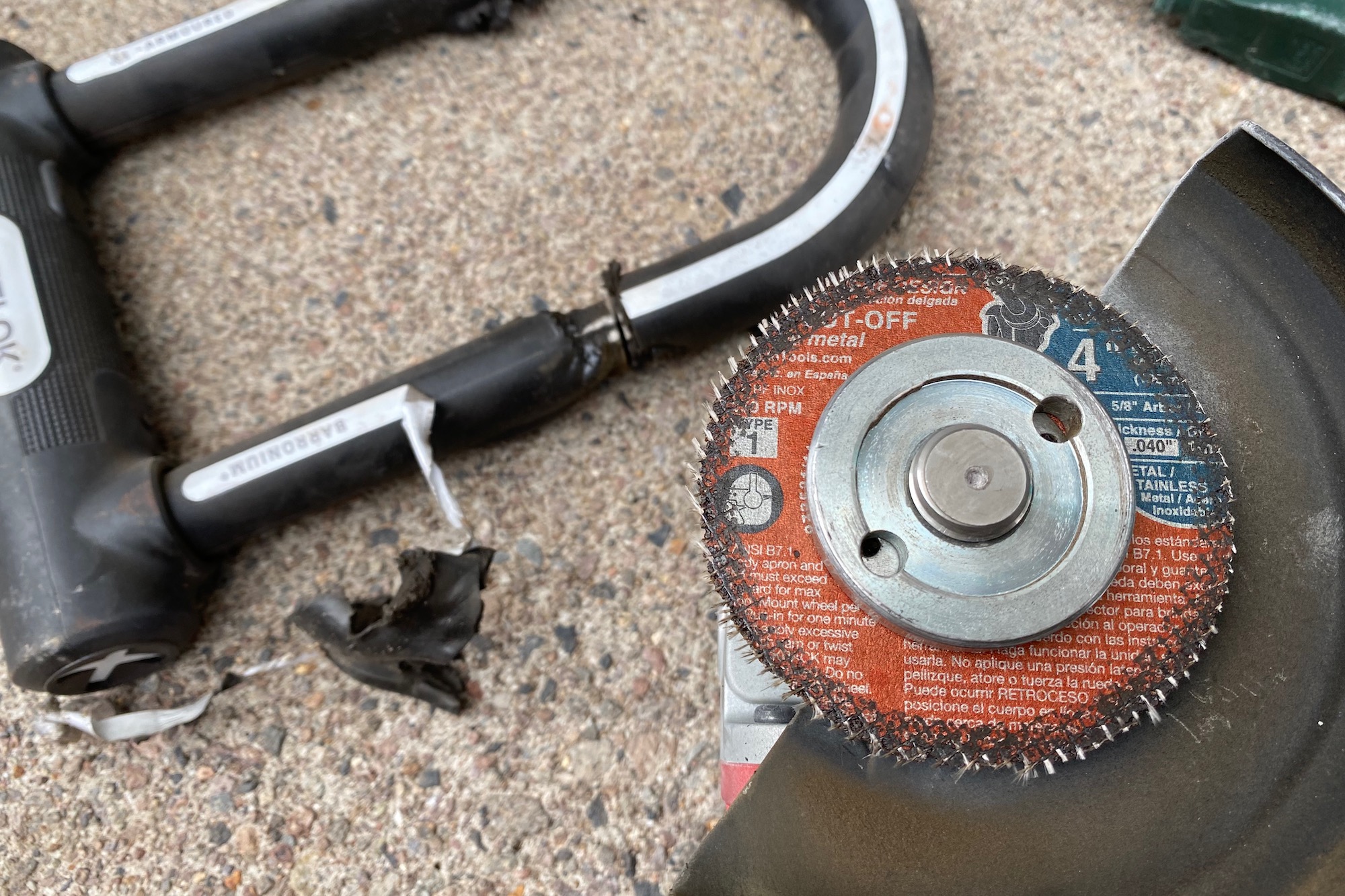an angle grinder cutting wheel after trying to cut through the Lietlok X1